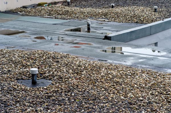 Tar And Gravel Roof Repair in Deland